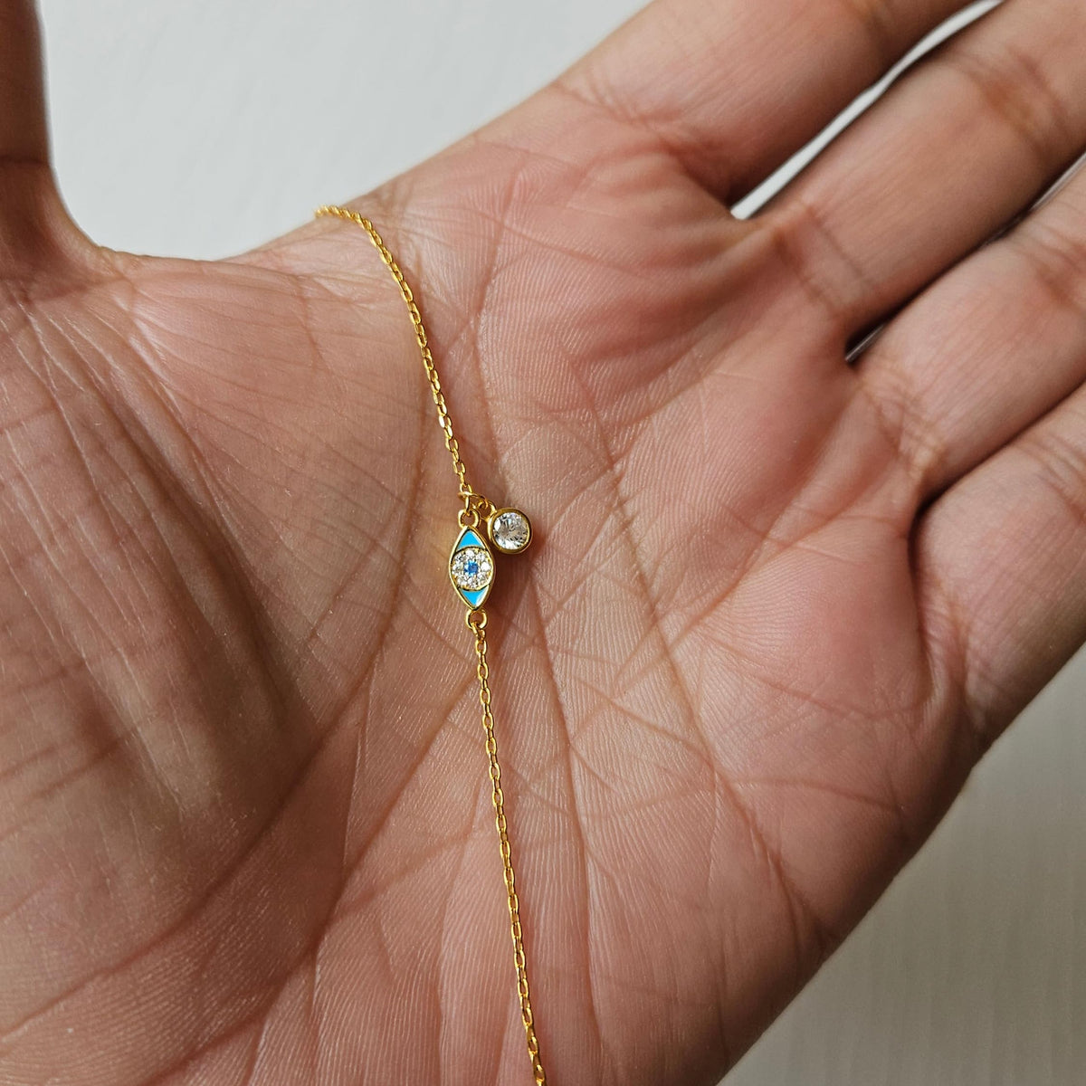 MYSTIC JEWELS - Pulsera de Plata 925 Bañado en Oro con Ojo Turquesa, Circonita Cúbica, Dije Móvil, Ajustable 16+3 cm