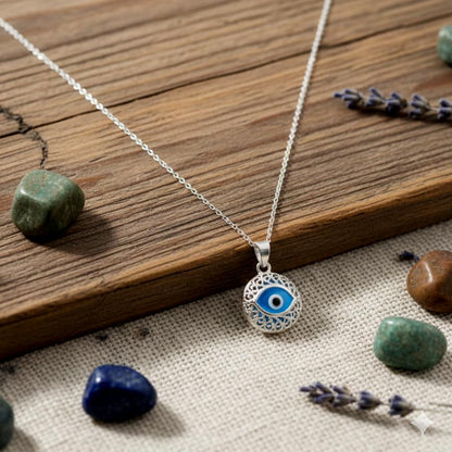 MYSTIC JEWELS - Collar de Mal de Ojo Redondo en Plata de Ley 925 – Amuleto de Protección con Cristal Azul de 10mm – Cadena Ajustable 40-45cm – Joyería para Mujer con Bolsa de Regalo