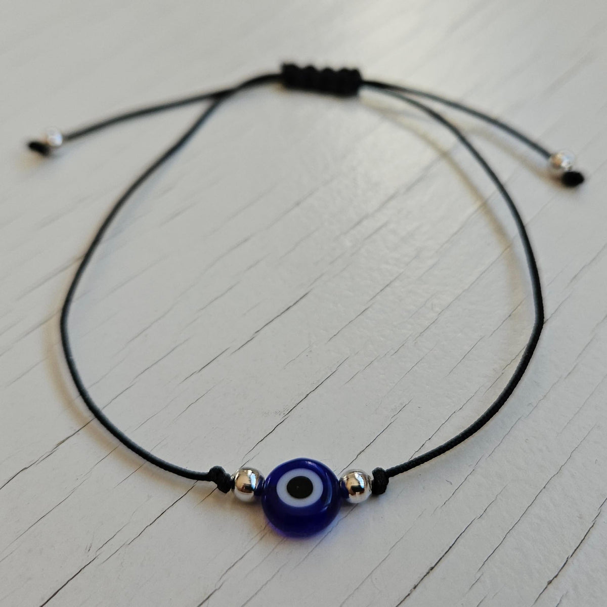 MYSTIC JEWELS - 10 Piezas Pulsera de Protección con Ojo Turco Azul Marino, Cordón Rojo Ajustable, Amuleto de la Suerte
